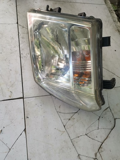 oryginalna lampa lewa przednia nissan navara